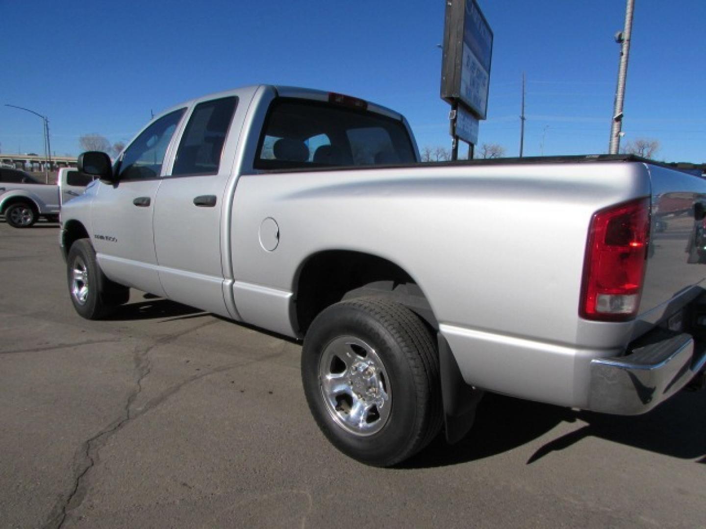 2005 Silver /Gray Dodge Ram 1500 SLT (1D7HU18D15S) with an 5.7 Hemi V8 engine engine, 5 speed automatic transmission, located at 4562 State Avenue, Billings, MT, 59101, (406) 896-9833, 45.769516, -108.526772 - 2005 Dodge Ram 1500 SLT Quad Cab Short Bed 4WD 5.7L V8 OHV 16V Hemi Engine - 5 speed automatic transmission - 4 wheel drive - 159,014 miles SLT package - air conditioning - tilt wheel - cruise control - AM/FM/CD audio - power windows and door locks - power drivers seat - privacy glass - keyles - Photo#0